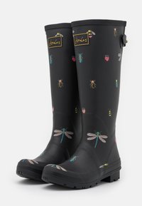 Bottes de pluie en caoutchouc noir avec des motifs colorés d'insectes, y compris des abeilles et des libellules. Semelle texturée pour une meilleure traction, sangle latérale ajustable.