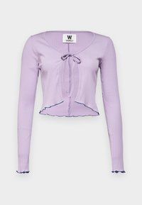 Lilac ribbed long-sleeve top with a V-neck, front tie closure, and ruffled hem and cuffs accentuated with dark blue trim.