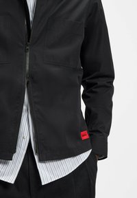HUGO EVALOM - Leichte Jacke - black one