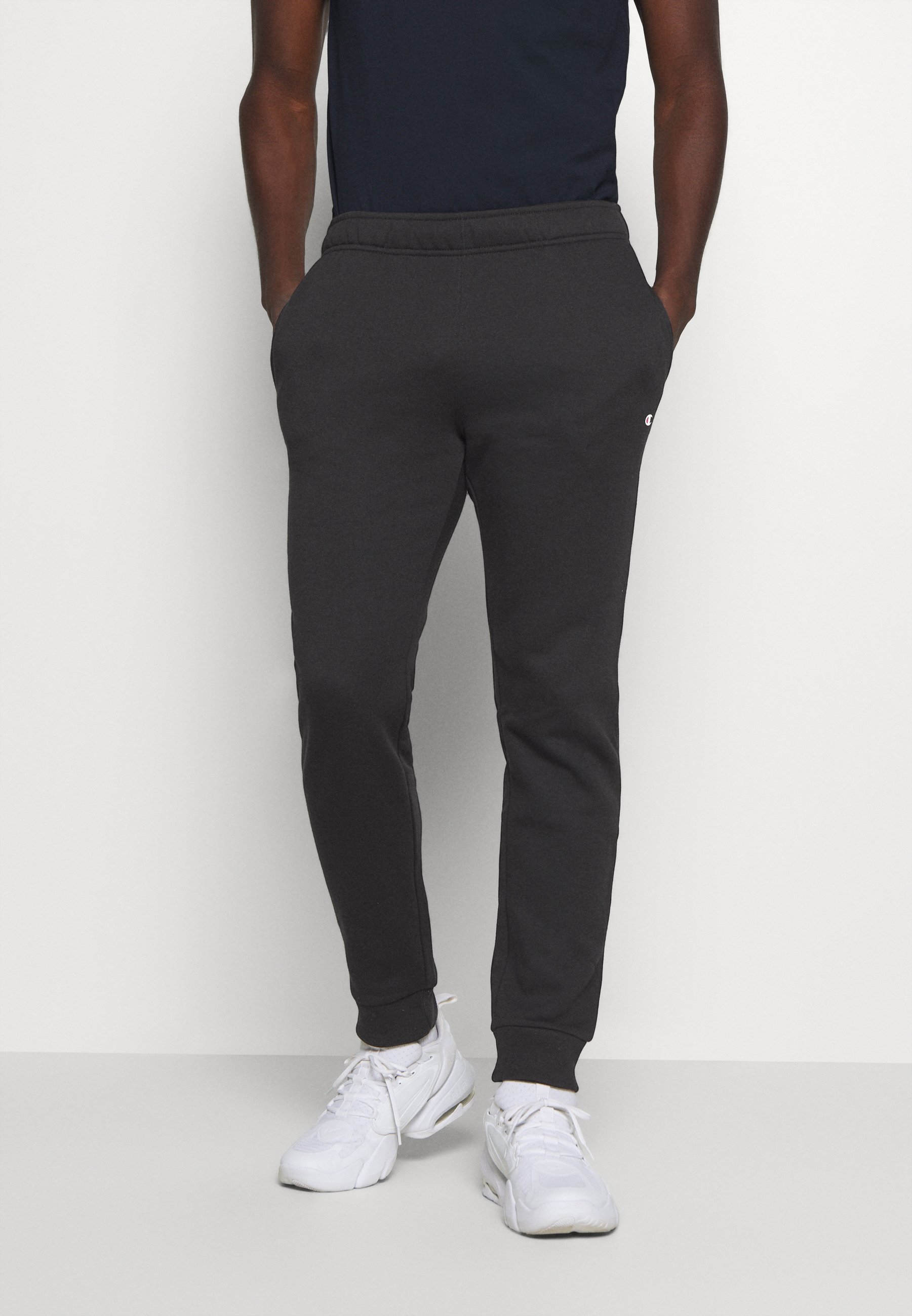 Champion LEGACY CUFF PANTS - Pantalones deportivos dark blue