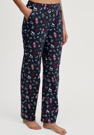 Maritieme pyjamabroek van een zachte stof, met een feestelijk patroon van notenkrakers, strikken en sneeuwvlokken. Inclusief zijzakken.