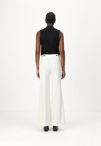 BOSS TALIA LONG - Nohavice - open white