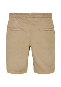 Shorts beige décontractés avec taille élastique et deux poches arrière horizontales sur fond uni.
