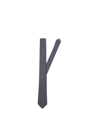 Navy blue textured men's necktie laid flat with the narrow end crossing behind the wider end on a white background.