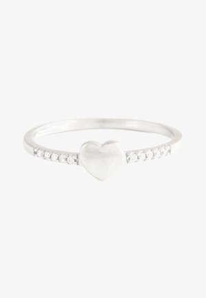 Silver ring with a polished heart centerpiece and small diamonds set along the band on each side.