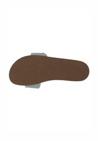 Sandal outsole with a textured brown rubber surface, featuring a light blue strap and a beige accent, providing comfort and grip.