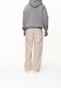 Pegador Jersey con capucha - grey