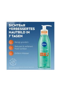 NIVEA Derma Skin Clear cleansing gel in a transparent green bottle with a white pump top. Product claims effective pore reduction and acne removal.