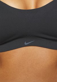 Nike Performance W NK ALATE MINIMALIST - Športová podprsenka s vysokou podporou - black/cool grey