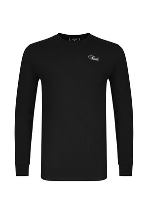 Camiseta negra de manga larga con cuello redondo, con un pequeño logo blanco "Siksilk" en la parte superior izquierda del pecho, puños acanalados y silueta ajustada.
