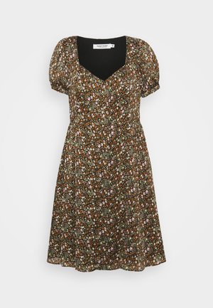 Musta kukkakuosinen mekko, jossa lyhyet pömppöhihat, v-pääntie ja levenevä hame. Mekon kukkakuosi koostuu pienistä monivärisistä kukista tummanvihreällä pohjalla.