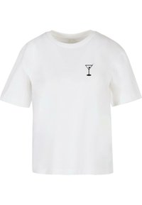 T-shirt en coton blanc avec un logo de verre à martini noir imprimé sur la poitrine gauche. Col ras-du-cou classique et manches courtes.