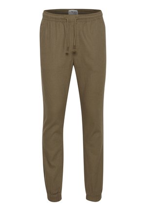 Pantalones jogger verde oliva hechos de una tela suave, con una cintura elástica y cordón, y puños ajustados en el tobillo.