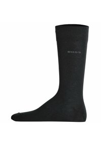 Schwarze Kniestrümpfe aus einem glatten, strukturierten Material. Mit einem gerippten Bündchen und einem dezenten grauen Logoaufdruck.