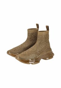Zapatillas estilo calcetín de color marrón, tejidas, con una parte superior texturizada y suela de goma marrón brillante, que presentan acentos sutiles y una tira para facilitar su uso.