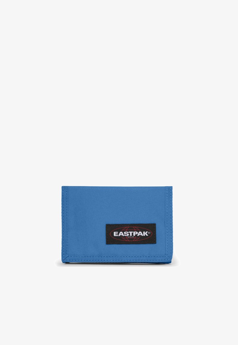 Blue fabric wallet with a folded design, featuring a black Eastpak logo patch. The surface has a smooth texture and neat stitching.