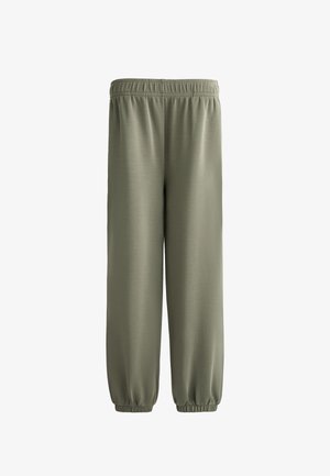 Joggers en mélange de coton olive, avec une taille élastique et des poignets élastiques aux chevilles pour un ajustement décontracté. Texture lisse.