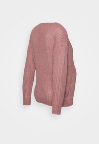 Gebreid sweater in zacht roze, met een ontspannen pasvorm, brede raglanmouwen en ribgebreide manchetten en zoom. Geweven, chunky breipatroon overal.