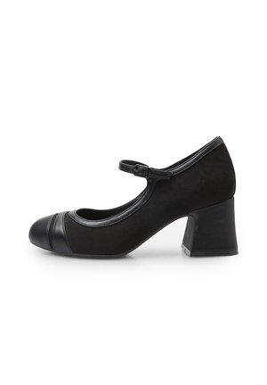 Black suede Mary Jane shoe with a round toe, contrasting leather cap toe detail, adjustable strap with buckle, and a square block heel.