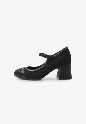 Chaussure Mary Jane en daim noir avec un bout rond, détail de capteur en cuir contrastant, sangle réglable avec boucle et talon carré.