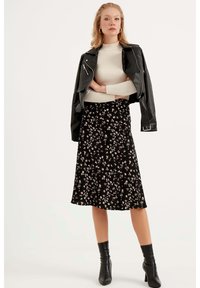 Herita Gonna a campana - black