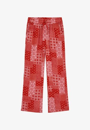 Pantalon rouge à jambes larges avec taille élastique et motifs floraux en patchwork dans différentes nuances de rouge et de rose.