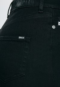 Big Star ADELA  - Bootcut-teksad - schwarz