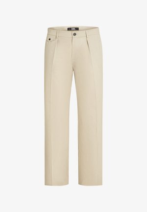 Beige Hosen aus Baumwollmischung, mit flachem Bund, zwei Falten und einer einzelnen Tasche an der linken Hüfte. Klassische Passform und gerade Beinform.