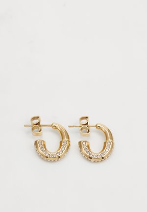 Gold hoop earrings featuring a curved design with clear rhinestone embellishments along the lower edge and a stud post closure.
