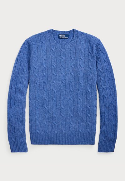 Μπλε πουλόβερ με παραδοσιακό πλέξιμο, χαρακτηρισμένο από στρογγυλή λαιμόκοψη και ριχτές μανσέτες και στρίφωμα. Φτιαγμένο από υλικό με υφή.