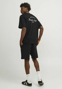 Jack & Jones PREMIUM Spodnji deli trenirk - schwarz
