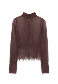 Brūna krokota blūze ar augstu apkakli, pogu aizdari aizmugurē un volānu apakšmalu. Garas piedurknes ar pogu detaļu pie aprocēm. Viegls audums.