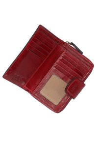 Red leather wallet with multiple card slots, a clear ID window, and a zippered compartment. Features a smooth texture and stitched edges.