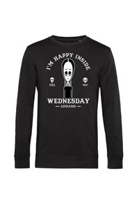 Felpa nera con una grafica di un personaggio con grandi occhi e lunghi capelli, il testo recita "SONO FELICE DENTRO MERCOLEDÌ ADDAMS."