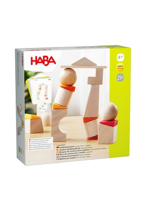 Holzset mit kreativen Bausteinen, Bällen und Orangenscheiben zum Balancieren und Stapeln, geeignet für Kinder ab vier Jahren.