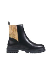 Botas de tobillo de cuero negro con un panel lateral texturizado marrón con un patrón. Suela de goma con taco grueso y tira de sujeción para facilitar el uso.