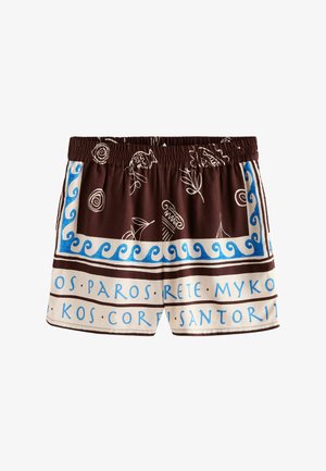 Brūnas un krēmkrāsas šorti ar zilām viļņu svītrām, baltu līniju mākslu ar grieķu motīviem un tekstu ar Grieķijas salu nosaukumiem apakšmalā.