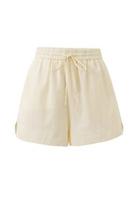 Helle gelbe Shorts mit elastischem Bund, Kordelzug und strukturiertem Material. Mit seitlichen Schlitzen für Komfort und Bewegungsfreiheit.