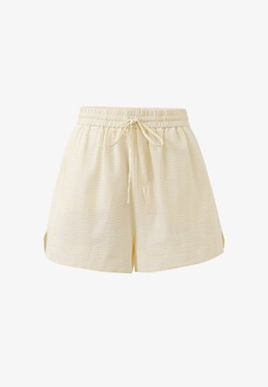 Helle gelbe Shorts mit elastischem Bund, Kordelzug und strukturiertem Material. Mit seitlichen Schlitzen für Komfort und Bewegungsfreiheit.