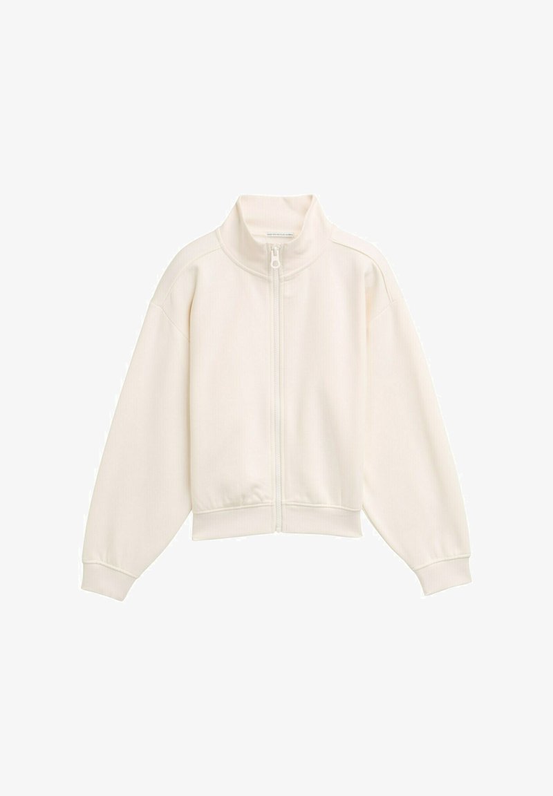 Veste blanche zippée avec un col montant, texture côtelée, épaules tombantes et poignets et ourlet élastiques. Design simple et minimaliste.