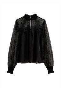 Blusa negra transparente con cuello alto con volantes, textura de lunares, detalles de encaje en el busto y mangas largas abullonadas con puños fruncidos.