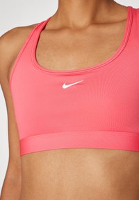 Nike Performance BRA - Sportski grudnjak s blagom potporom - aster pink/white