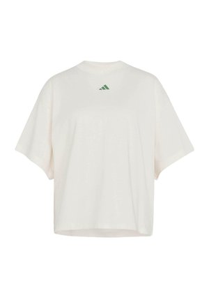 Oversized short-sleeve T-shirt in light cream cotton with a green Adidas logo on the upper back. Features relaxed fit and crew neckline.