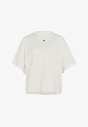 Oversized short-sleeve T-shirt in light cream cotton with a green Adidas logo on the upper back. Features relaxed fit and crew neckline.