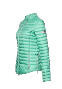 Lightweight mint green puffer jacket with horizontal stitching, high collar, side zip pockets, and a logo patch on the upper arm.