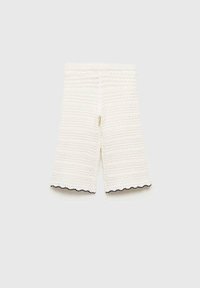 White crochet shorts with a textured pattern and scalloped black trim at the hem, featuring an elastic waistband for comfort.