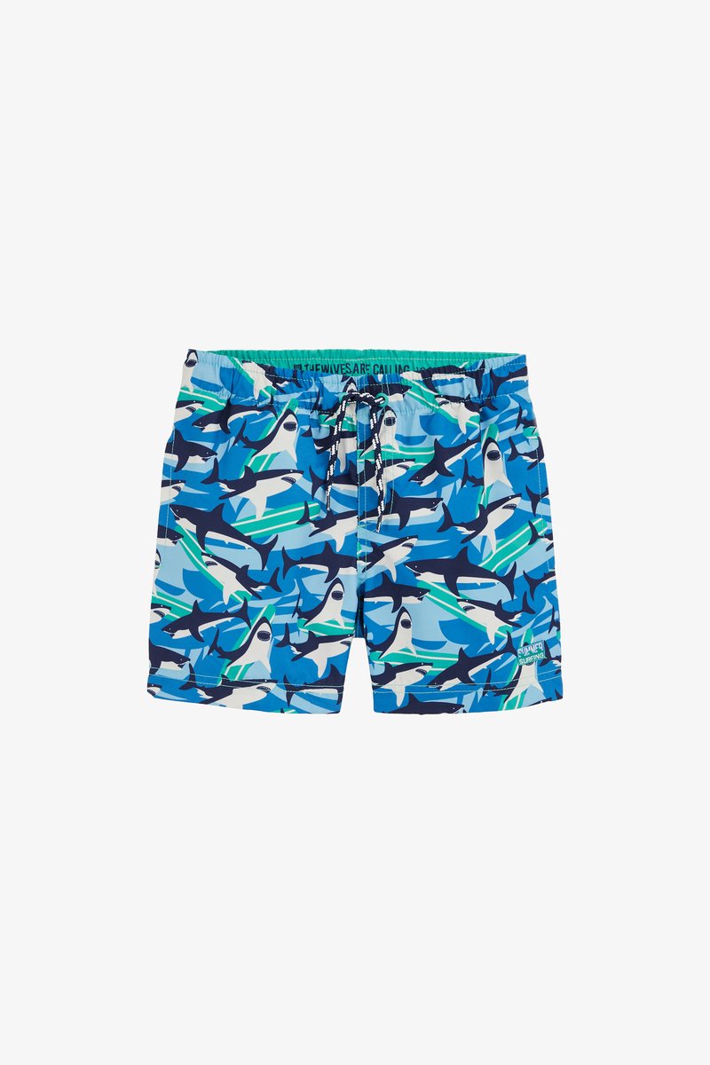 Mėlynos maudymosi šortai su ryklių raštu, kuriame yra žalių ir baltų atspalvių. Elastingas juosmuo su raišteliu; lengva, greitai džiūvanti medžiaga.