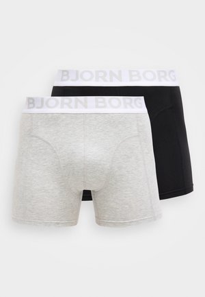 Two pairs of men's boxer briefs, one gray and one black, featuring a white elastic waistband with "BJORN BORG" logo, made of cotton blend fabric.
