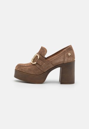Brown suede platform loafers with a rounded toe, block heel, and gold decorative hardware detail on the front strap.