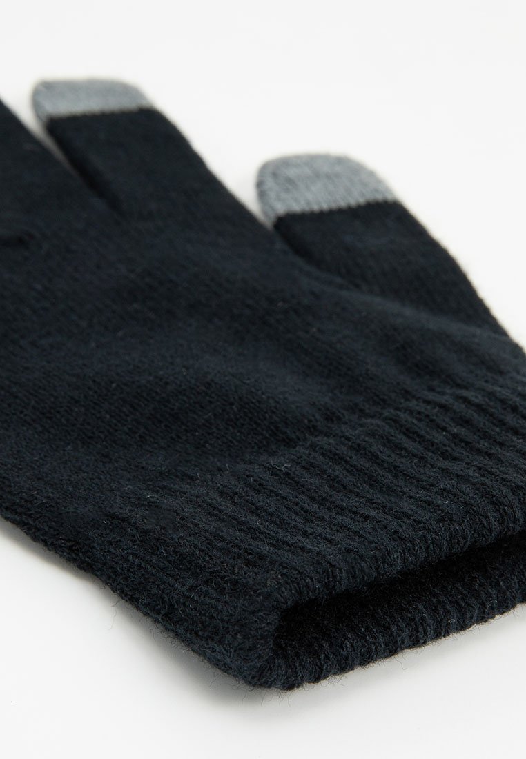 Schwarze gestrickte Handschuhe mit grauen Spitzen und einem gerippten Bündchen. Weicher Stoff und fingerlose Gestaltung für eine einfache Benutzung.